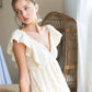 OPEN TIE BACK BABYDOLL DRESS