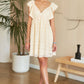 OPEN TIE BACK BABYDOLL DRESS