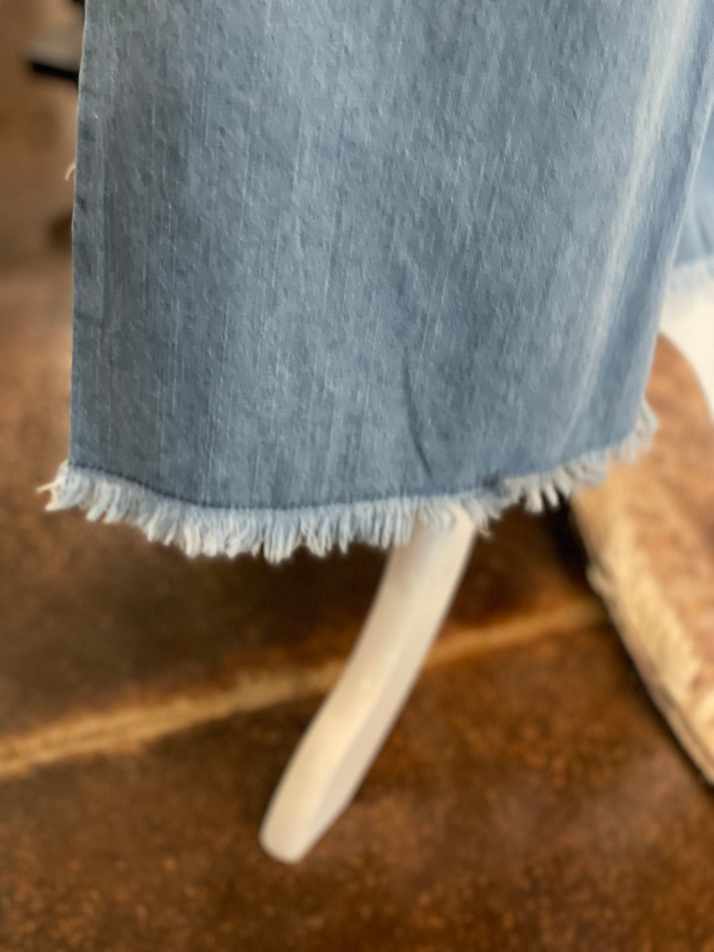 Washed Denim Pants with Fringe Hem