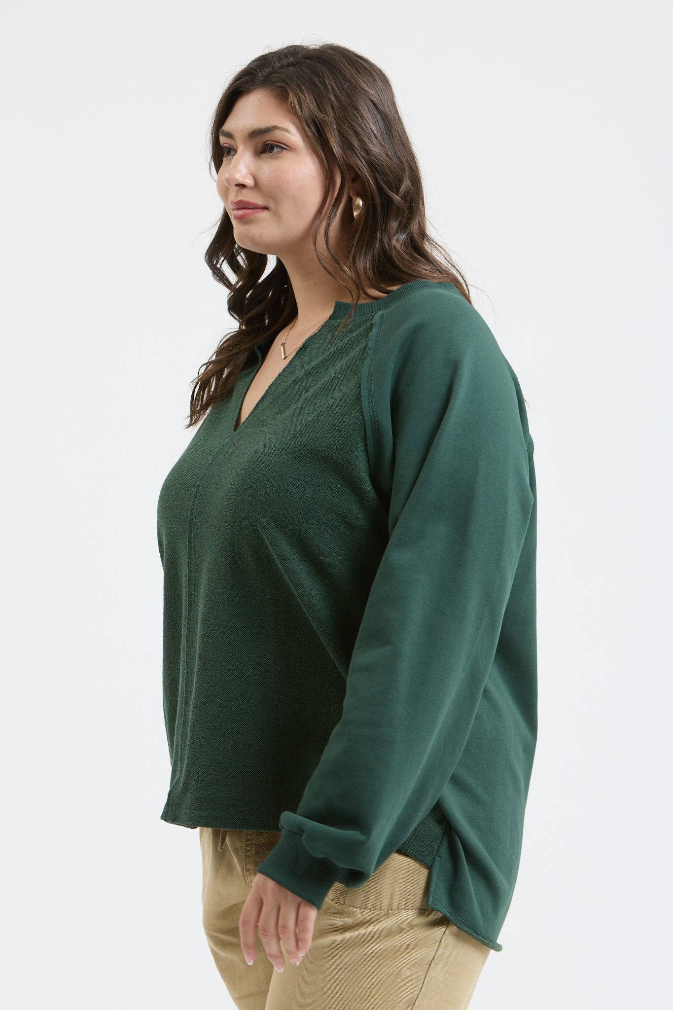 EXPOSED SEAM RELAXED LONG SLEEVE KNIT TOP